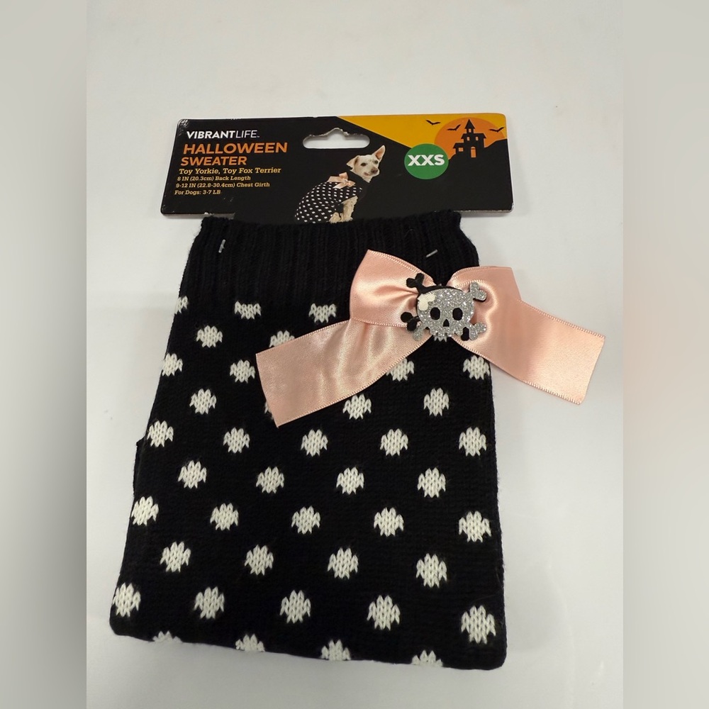 Vibrant Black and White Dog Sweater with Pink Bow